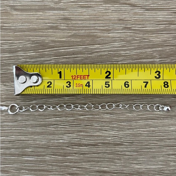 A Silver-Tone Simulated Polished Abalone and Rhinestone Kenneth Cole Necklace - Picture 10 of 10